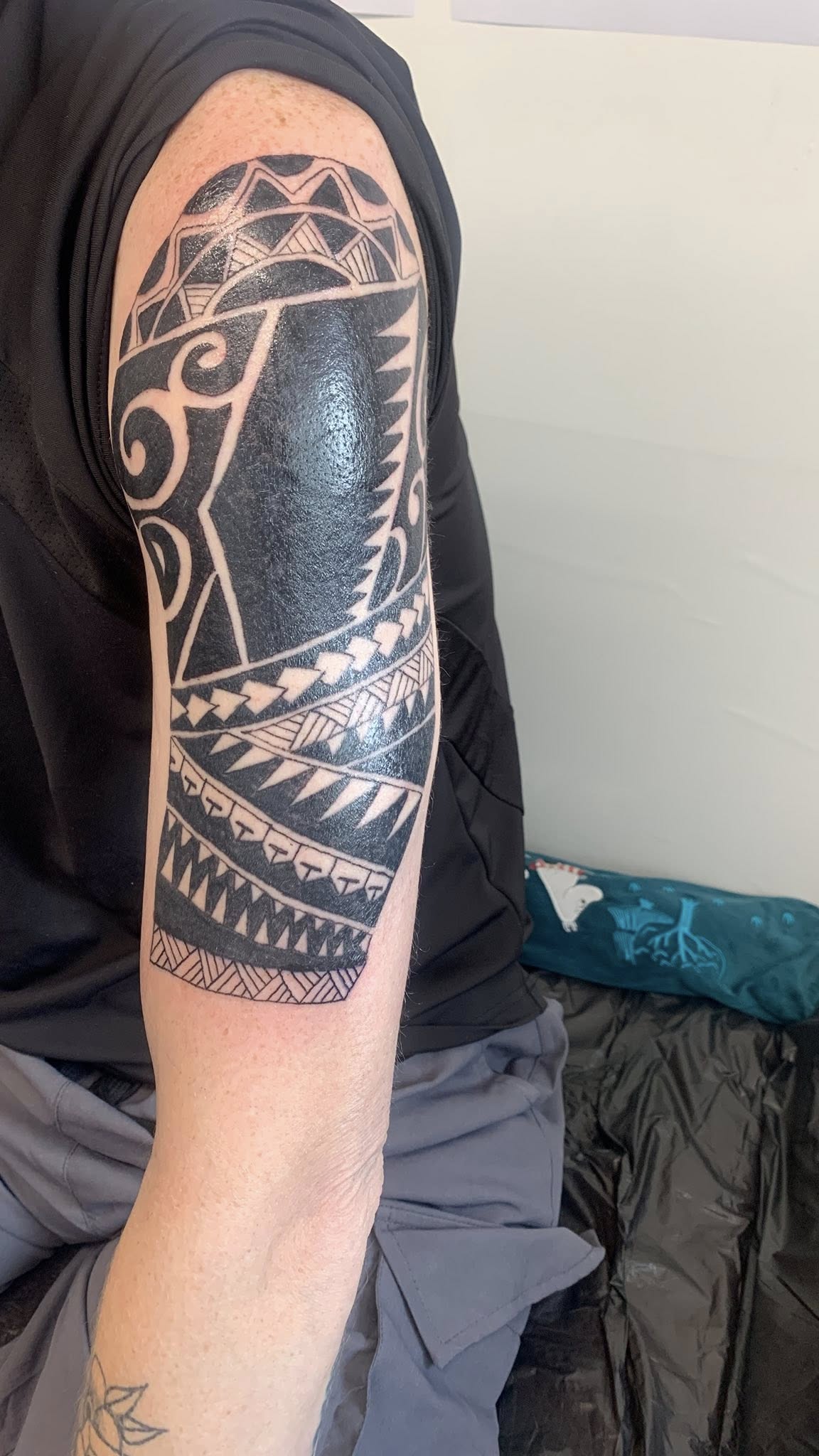 Delicate fine line botanical tattoo by Ink By LOLO Southport area